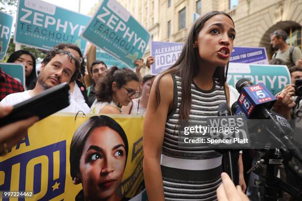 Congressional nominee Alexandria Ocasio-Cortez stands with Zephyr Teachout after endorsing her for New York City Public Advocate on July 12, 2018 in...