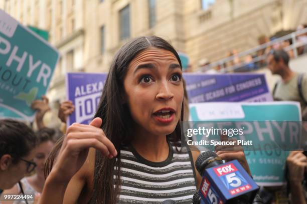 Congressional nominee Alexandria Ocasio-Cortez stands with Zephyr Teachout after endorsing her for New York City Public Advocate on July 12, 2018 in...