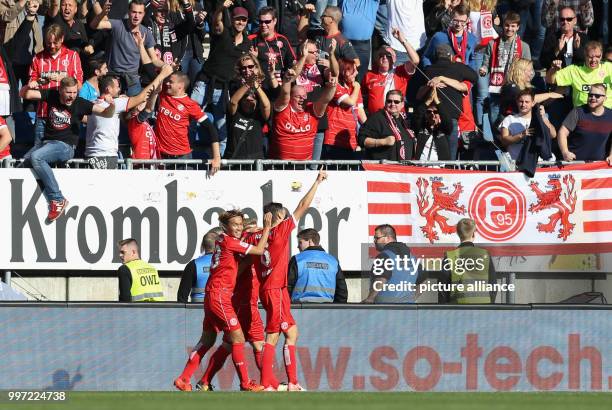 Bundesliga, Arminia Bielefeld - Duesseldorf's goal scorer Florian Neuhaus celebrates his 0-2 goal with Takashi Usami during the German 2nd division...