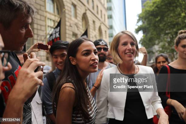 Congressional nominee Alexandria Ocasio-Cortez stands with Zephyr Teachout after endorsing her for New York City Public Advocate on July 12, 2018 in...