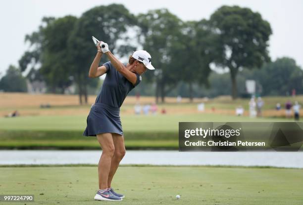 Suzy Whaley plays a tee shot on the 10th hole during the first round of the U.S. Senior Women's Open at Chicago Golf Club on July 12, 2018 in...