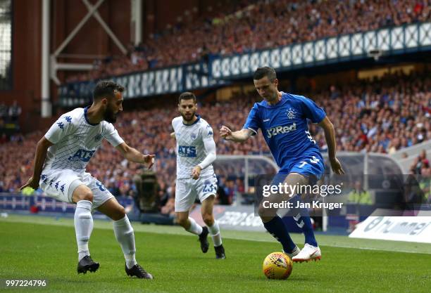 Jamie Murphy of Rangers controls the ball from Ermedin Adem of FC Shkupi during the UEFA Europa League Qualifying Round match between Rangers and...