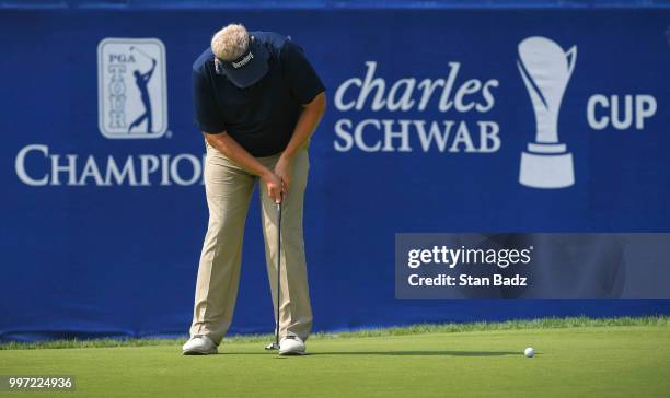 Colin Montgomerie hits a putt on the 18th green during the first round of the PGA TOUR Champions Constellation SENIOR PLAYERS Championship at Exmoor...