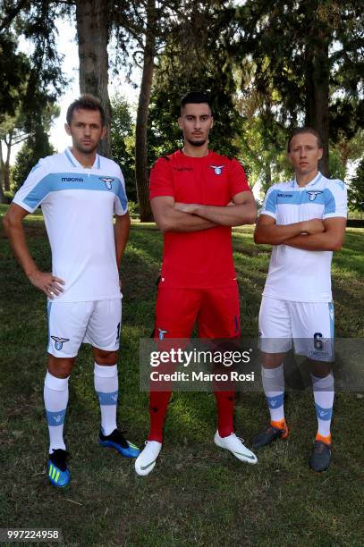 Senad Lulic, Thomas Strakosha and Lucas Leiva of SS Lazio attend the SS Lazio unveil new shirt for 2018-19 Season on July 12, 2018 in Rome, Italy.