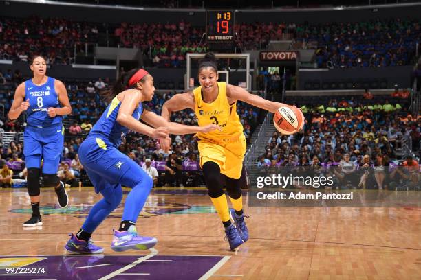 Candace Parker of the Los Angeles Sparks handles the ball against the Dallas Wings on July 12, 2018 at STAPLES Center in Los Angeles, California....