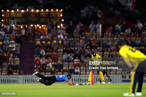 Luke Wright of Sussex slides in to the crease during the Vitality Blast match between Hampshire and Sussex Sharks at The Ageas Bowl on July 12, 2018...