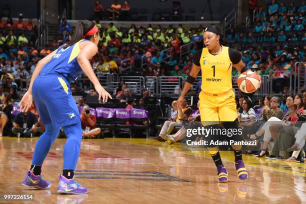 Odyssey Sims of the Los Angeles Sparks handles the ball against the Dallas Wings on July 12, 2018 at STAPLES Center in Los Angeles, California. NOTE...