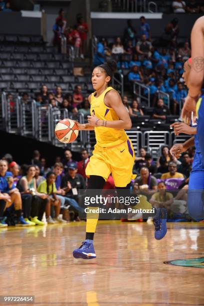 Candace Parker of the Los Angeles Sparks handles the ball against the Dallas Wings on July 12, 2018 at STAPLES Center in Los Angeles, California....