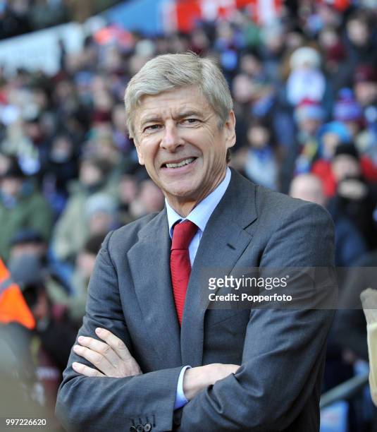 Arsenal manager Arsene Wenger smiles before the Barclays Premier League match between Aston Villa and Arsenal at Villa Park on November 27, 2010 in...