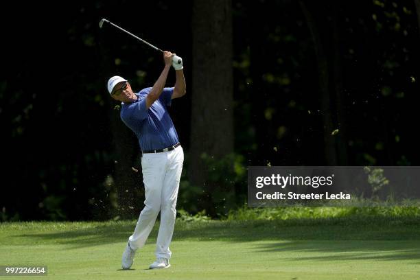 Davis Love III hits a shot on the sixth hole during the first round of the John Deere Classic at TPC Deere Run on July 12, 2018 in Silvis, Illinois.