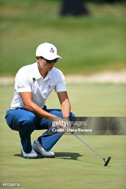 Whee Kim of Korea lines up a putt on the 15th green during the first round of the John Deere Classic at TPC Deere Run on July 12, 2018 in Silvis,...