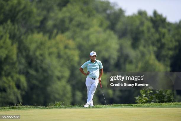 Sung Kang of Korea waits to putt on the 16th green during the first round of the John Deere Classic at TPC Deere Run on July 12, 2018 in Silvis,...