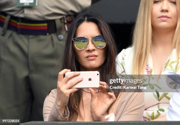 Olivia Munn attends day ten of the Wimbledon Tennis Championships at the All England Lawn Tennis and Croquet Club on July 12, 2018 in London, England.