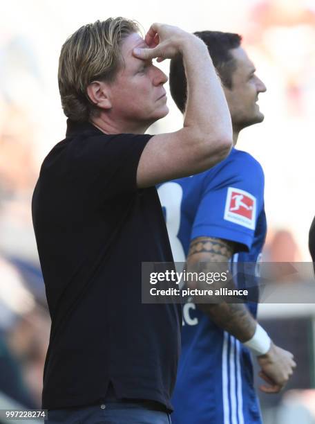 Hamburg's coach Markus Gisdol standing at the edge of the playing field with Sejad Salihovic during the German Bundesliga soccer match between 1. FSV...