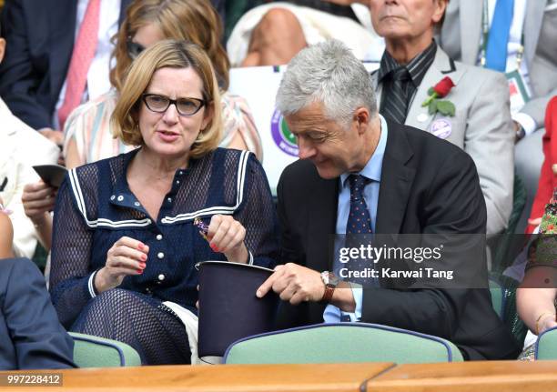 Amber Rudd and Russell Chambers attend day ten of the Wimbledon Tennis Championships at the All England Lawn Tennis and Croquet Club on July 12, 2018...