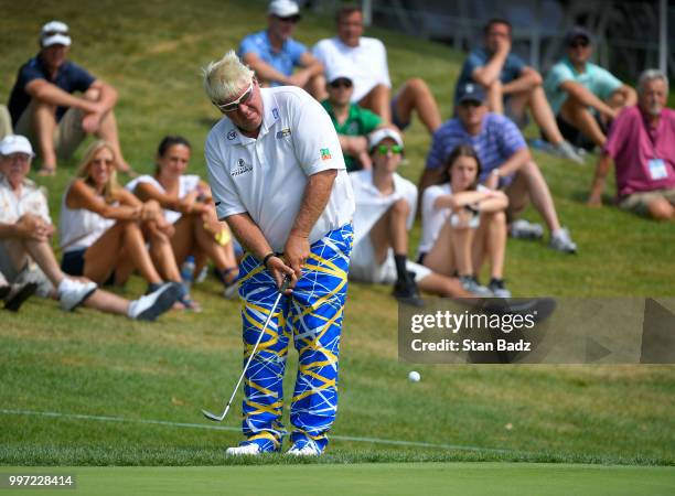 John Daly plays a chip shot on the 18th hole during the first round of the PGA TOUR Champions Constellation SENIOR PLAYERS Championship at Exmoor...