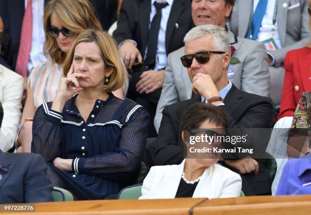 Amber Rudd and Russell Chambers attend day ten of the Wimbledon Tennis Championships at the All England Lawn Tennis and Croquet Club on July 12, 2018...