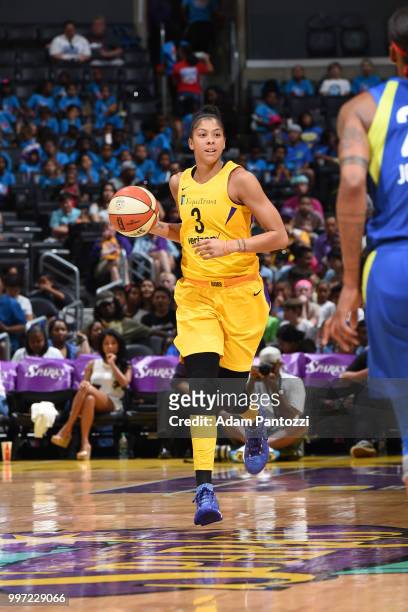 Candace Parker of the Los Angeles Sparks handles the ball against the Dallas Wings on July 12, 2018 at STAPLES Center in Los Angeles, California....