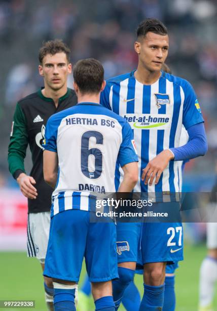 Schalke's Leon Goretzka, Hertha's Vladimir Darida and Hertha's Davie Selke after the German Bundesliga soccer match between Hertha BSC and FC Schalke...