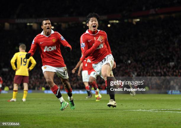 Park Ji-sung of Manchester United celebrates after scoring with teammate Nani during the Barclays Premier League match between Manchester United and...