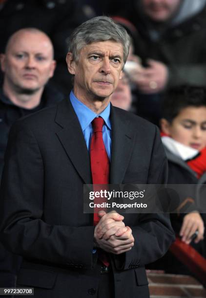 Arsenal manager Arsene Wenger looks on during the Barclays Premier League match between Manchester United and Arsenal at Old Trafford on December 13,...