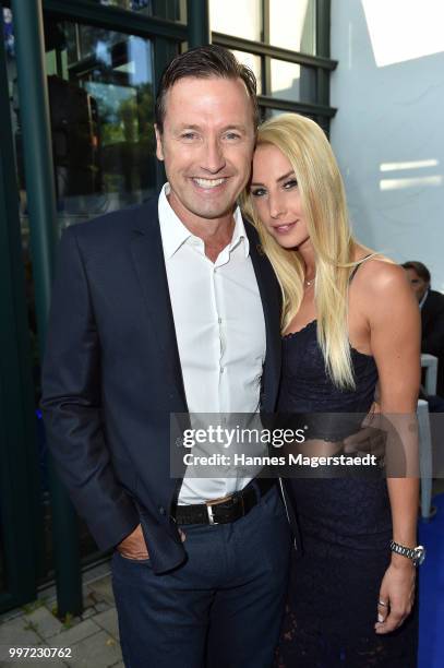 Norbert Dobeleit and his girlfriend Zsuzsi Gyuris during the dinner Royal at the Gruenwalder Einkehr on July 12, 2018 in Munich, Germany.