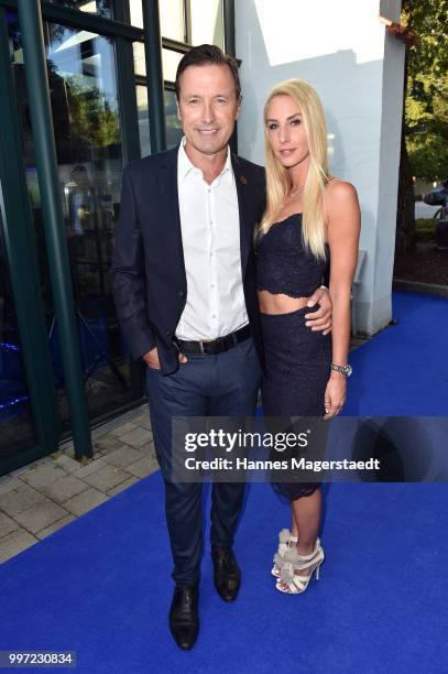 Norbert Dobeleit and his girlfriend Zsuzsi Gyuris during the dinner Royal at the Gruenwalder Einkehr on July 12, 2018 in Munich, Germany.