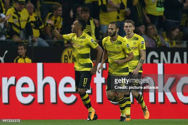 Dortmund's Pierre-Emerick Aubameyang celebrates scoring during the German Bundesliga soccer match between Borussia Dortmund and RB Leipzig at the...