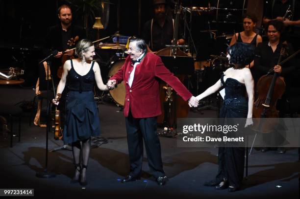 Satu Vanska, Barry Humphries and Meow Meow bow during the press night performance of "Barry Humphries' Weimar Cabaret" at The Barbican Centre on July...