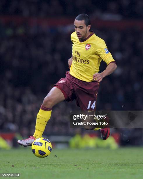 Theo Walcott of Arsenal in action during the Barclays Premier League match between Manchester United and Arsenal at Old Trafford on December 13, 2010...