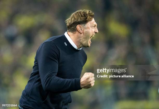 Leipzig head coach Ralph Hasenhuttl celebrating victory after the final whistle of the German Bundesliga soccer match between Borussia Dortmund and...