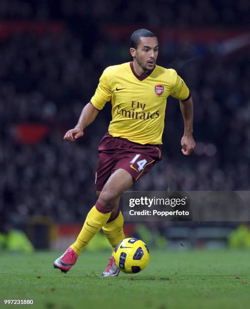 Theo Walcott of Arsenal in action during the Barclays Premier League match between Manchester United and Arsenal at Old Trafford on December 13, 2010...