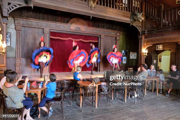 Performance of the can-do dancers before tourists in the salon in Almeria, Spain, on 30 June 2018. Western films as mythical as &quot;The good, the...