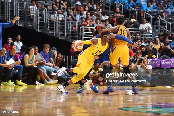 Essence Carson of the Los Angeles Sparks handles the ball against the Dallas Wings on July 12, 2018 at STAPLES Center in Los Angeles, California....