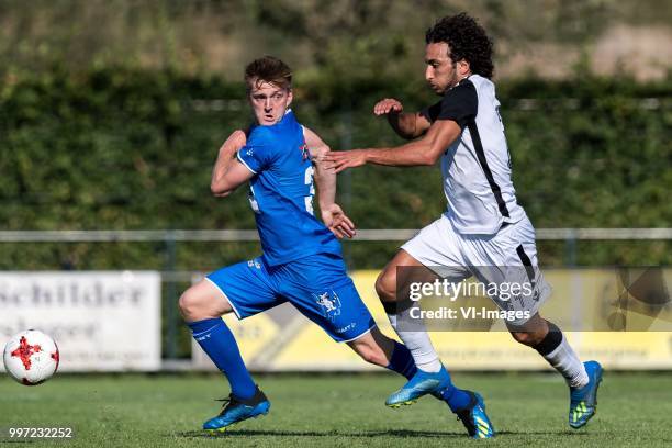 Thomas Foket of KAA Gent , Amr Warda of Paok Saloniki during the friendly match between PAOK Saloniki and KAA Gent at sportcomplex Schuytgraaf on...