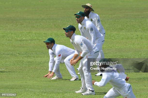 South African cricketers Hashim Amla,Faf du Plessis, Aiden Markram and Dean Elgar take the field in the slip cordon during the first day's play in...