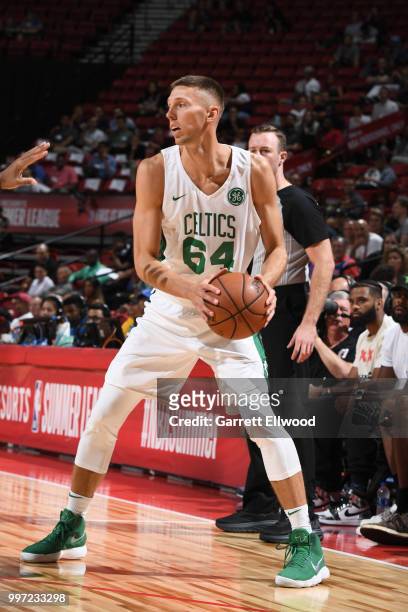Jarrod Uthoff of the Boston Celtics handles the ball against the New York Knicks during the 2018 Las Vegas Summer League on July 12, 2018 at the...
