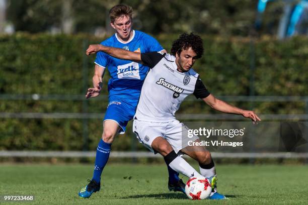 Thomas Foket of KAA Gent , Amr Warda of Paok Saloniki during the friendly match between PAOK Saloniki and KAA Gent at sportcomplex Schuytgraaf on...