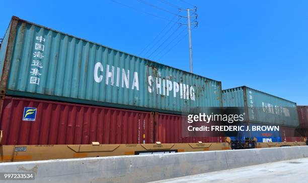 Shipping containers, including those of China Shipping, a shipping conglomerate under direct administration of China'a State Council, await...