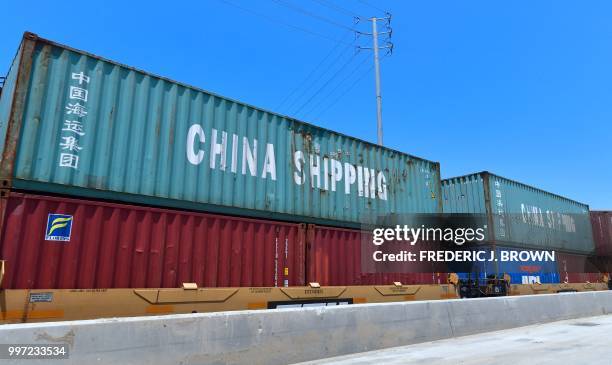 Shipping containers, including those of China Shipping, a shipping conglomerate under direct administration of China'a State Council, await...