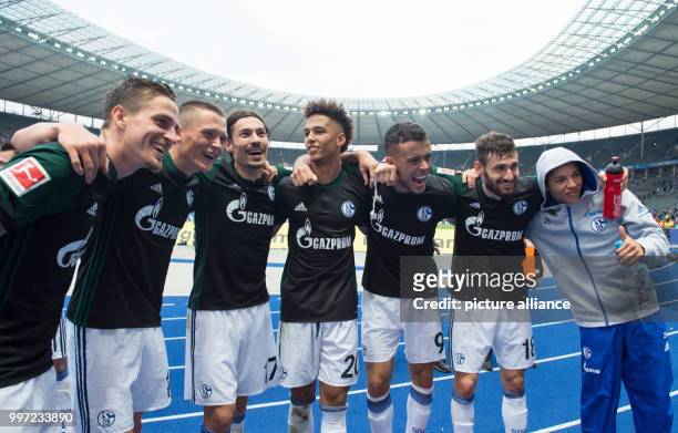 Schalke players Bastian Oczipka, Fabian Reese, Benjamin Stambouli, Thilo Kehrer, Franco Di Santo, Daniel Caligiuri and Amine Harit pose together for...