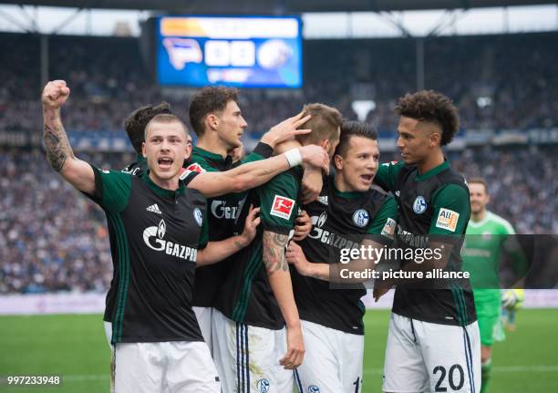 Schalke's goal getter Guido Burgstaller celebrates with his teammates Max Meyer, Leon Goretzka, Yevhen Konoplyanka and Thilo Kehrer after scoring the...