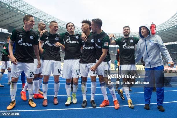 Schalke's Bastian Oczipka , Naldo, Fabian Reese, Benjamin Stambouli, Thilo Kehrer, Franco Di Santo, Daniel Caligiuri and Amine Harit stand together...