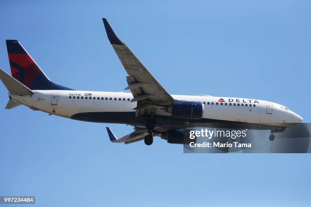 Delta Air Lines plane lands at Los Angeles International Airport on July 12, 2018 in Los Angeles, California. Delta announced today that it will...