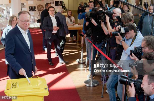 Stephan Weil, Lower Saxony's prime minister from the Social Democratic Party of Germany , casts his vote for the regional elections in Lower Saxony...