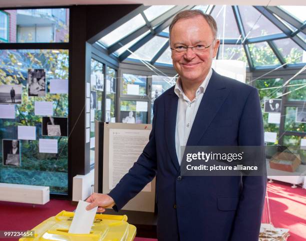 Stephan Weil, Lower Saxony's prime minister from the Social Democratic Party of Germany , casts his vote for the regional elections in Lower Saxony...