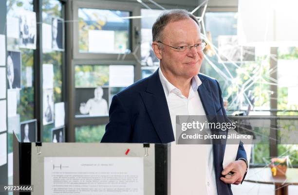 Stephan Weil, Lower Saxony's prime minister from the Social Democratic Party of Germany , casts his vote for the regional elections in Lower Saxony...