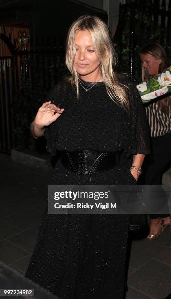 Kate Moss seen leaving Annabel's club on July 12, 2018 in London, England.