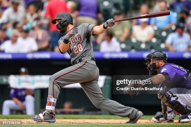 Steven Souza Jr. #28 of the Arizona Diamondbacks hits a fourth inning leadoff triple against the Colorado Rockies at Coors Field on July 12, 2018 in...