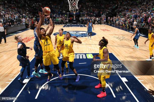 Rebekkah Brunson of the Minnesota Lynx and Alana Beard of the Los Angeles Sparks reach for the ball during the game on July 5, 2018 at Target Center...